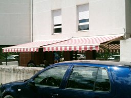 201309 Store banne - Toile de protection solaire Dickson Orchestra coloris sienne semi-coffre automatique Eolis RTS Somfy télécommande Somfy Smoove 1