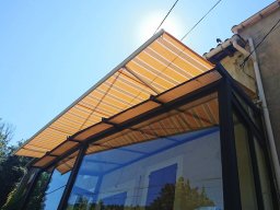 202010 Store banne - Réfection dune toile de protection solaire pour store à banne Somfy articulé sur véranda 1 (img_FB)